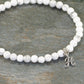 Close up of 4mm White Howlite Bracelet with Initial.