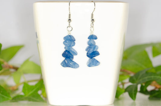 Simple Blue Quartzite Crystal Chip Earrings displayed on a tea cup.
