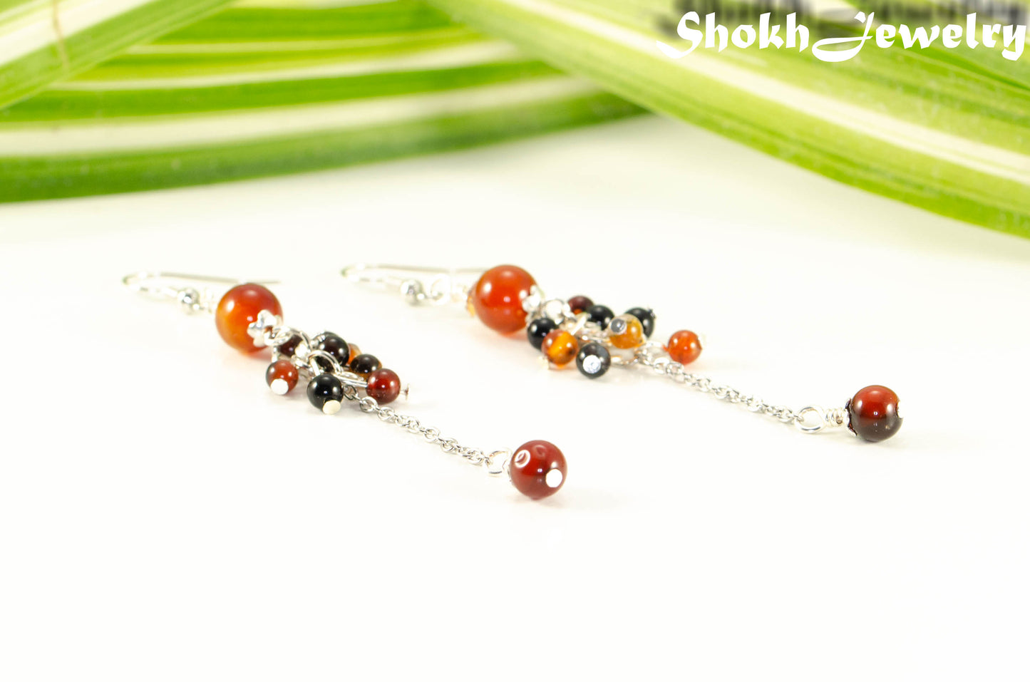 Close up of Long Stainless Steel Chain and Carnelian Earrings