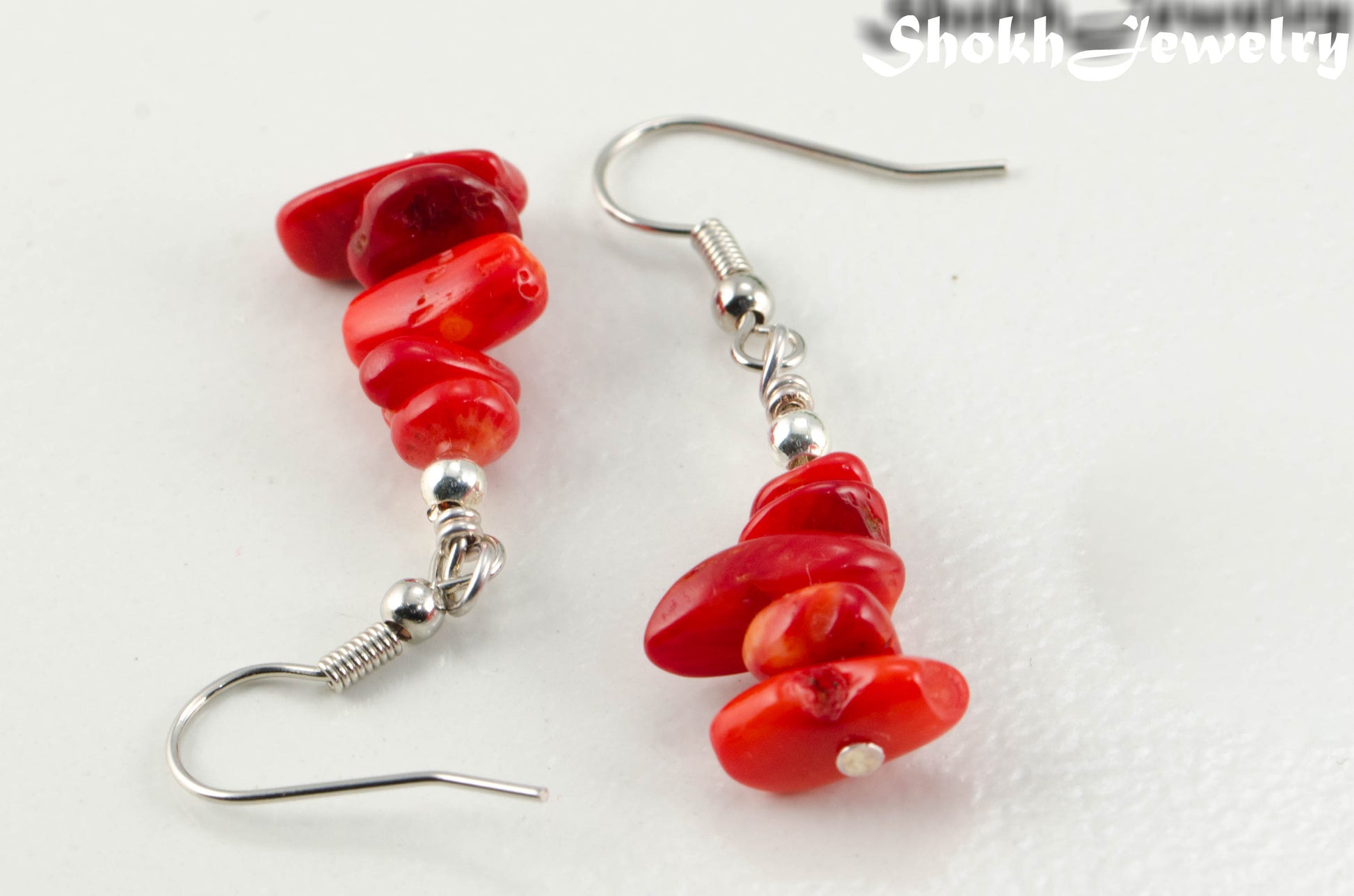 Close up of Simple Red Coral Chip Earrings.