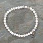 Top view of 4mm White Howlite Bracelet with Initial.