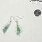Natural Green Aventurine Crystal Chip Earrings beside a dime