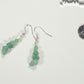 Simple Green Aventurine Crystal Chip Earrings beside a dime.