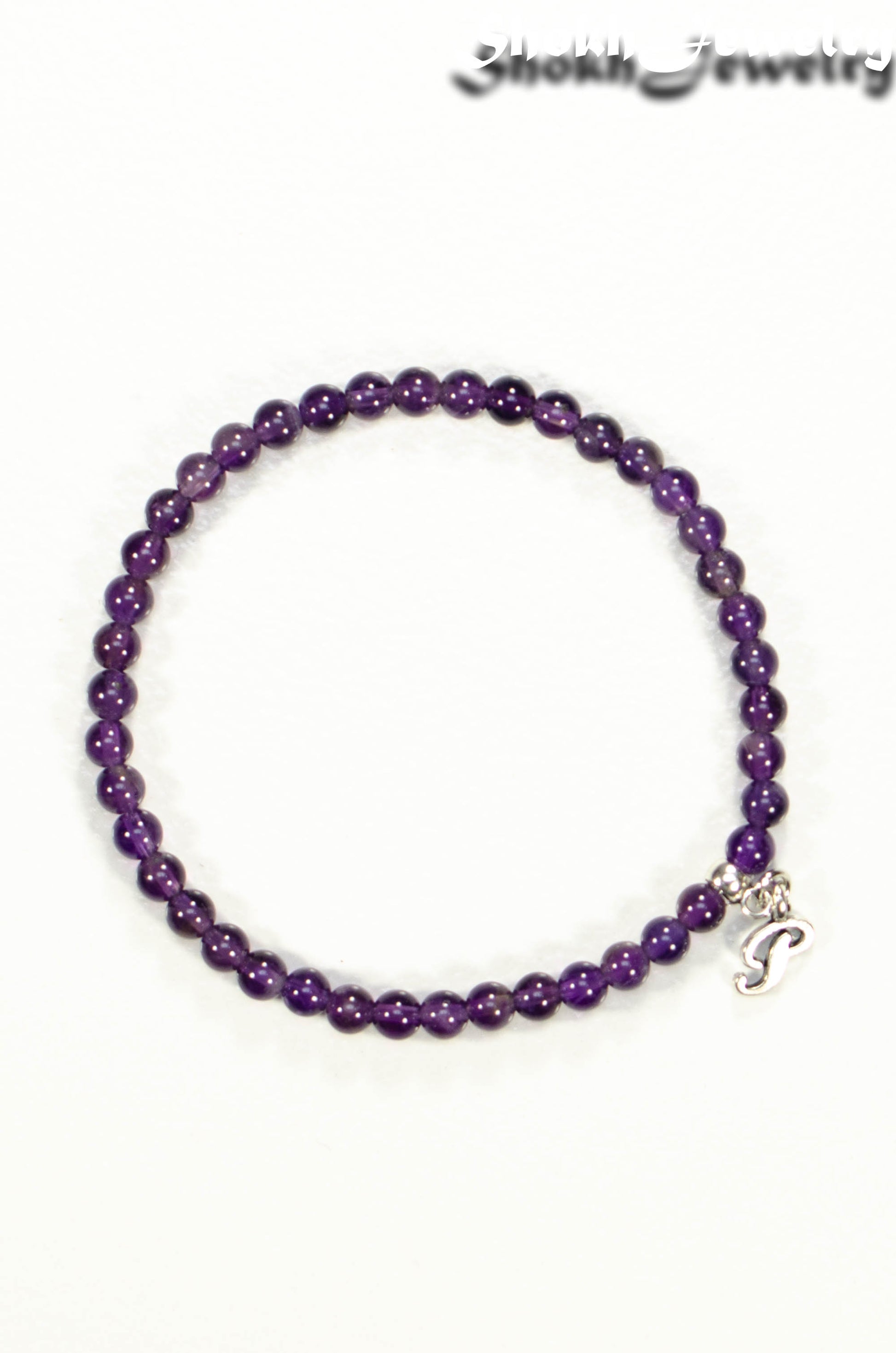 Top view of 4mm Amethyst Bracelet with Initial