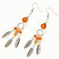 Top view of Statement Carnelian Crystal And Feather Earrings.