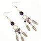 Top view of Statement Amethyst Crystal And Feather Earrings.