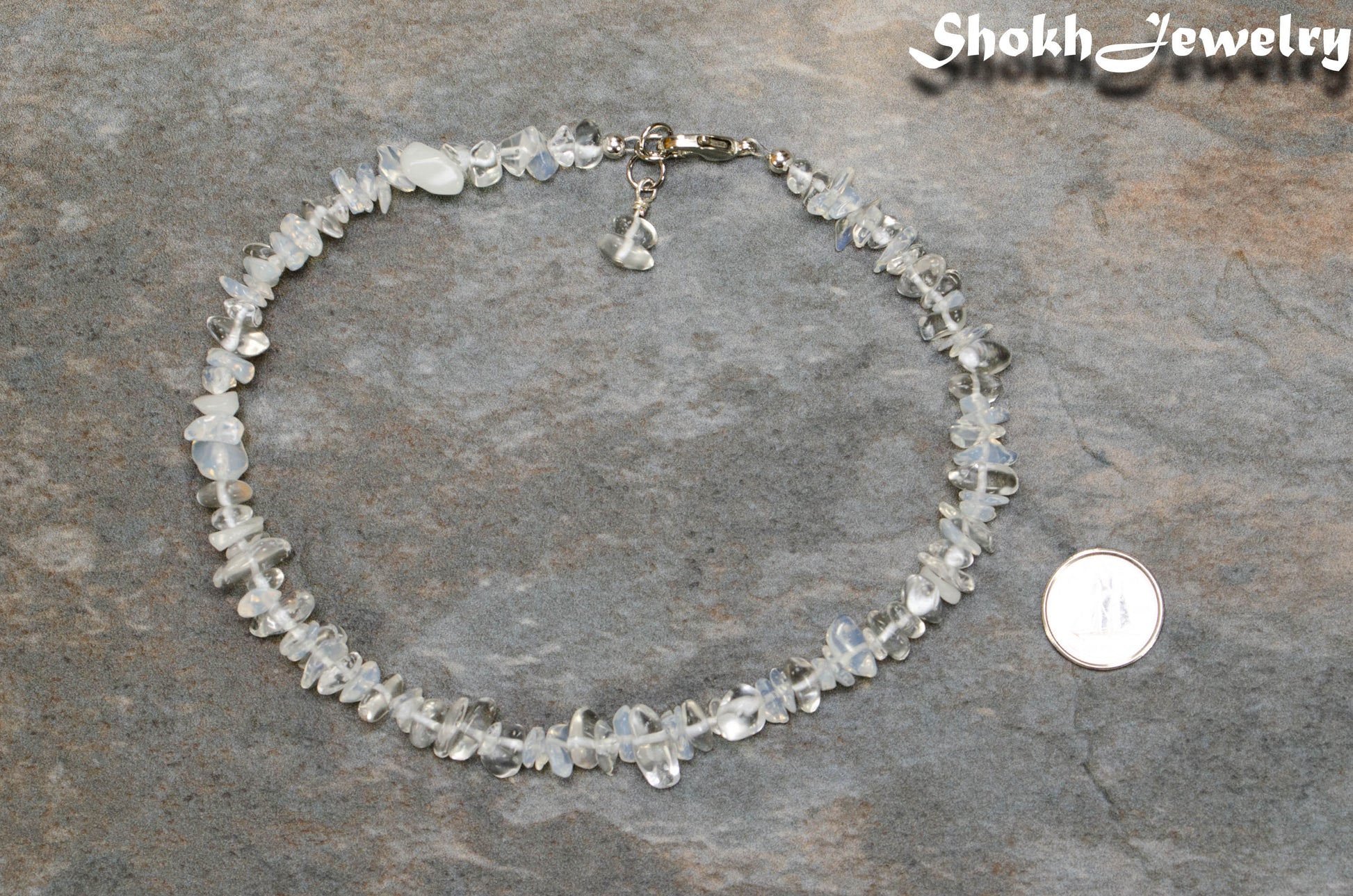 Natural White Opal Crystal Chip Anklet beside a dime.