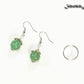 12mm Natural Green Aventurine Crystal Earrings beside a dime