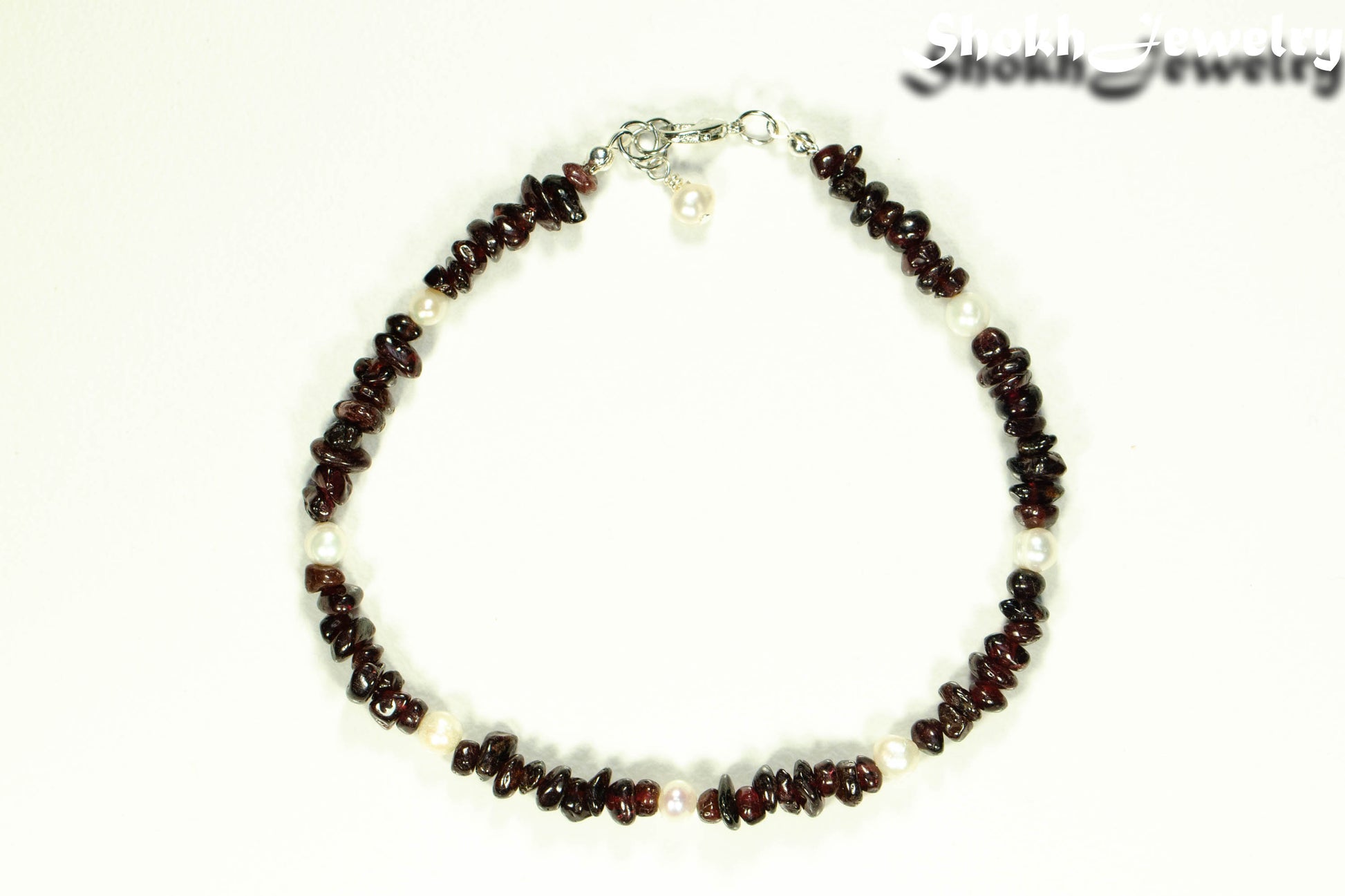 Top view of Natural Garnet Crystal Chip and Pearl Anklet.