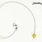 Dainty Citrine Choker Necklace beside a dime