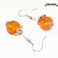 Close up of 12mm Natural Carnelian Crystal Earrings