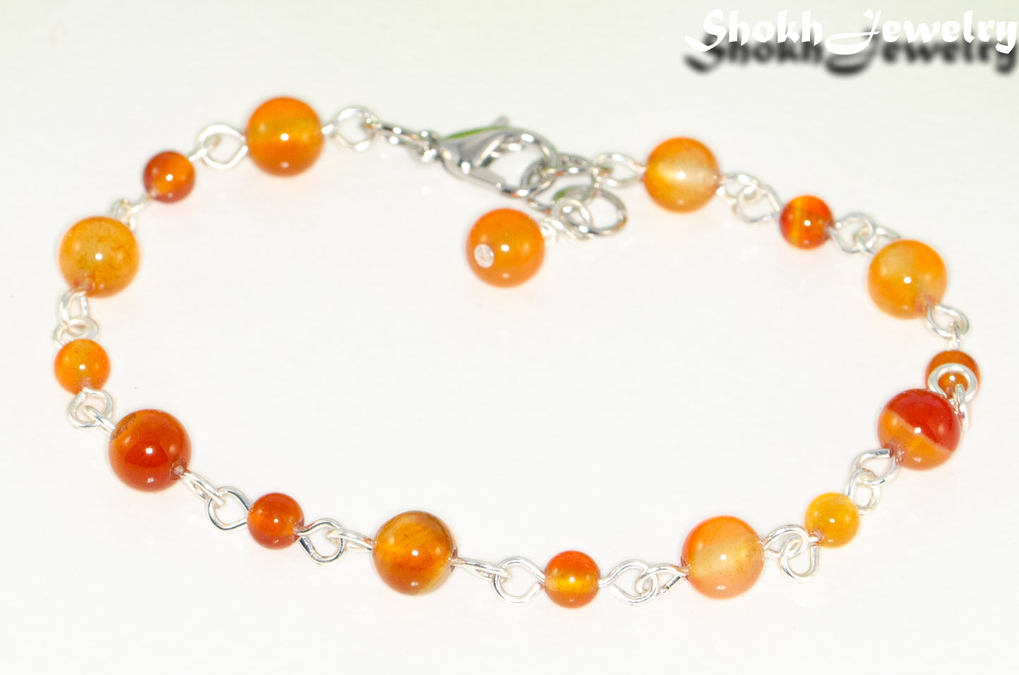 Close up of Handmade Carnelian Link Bracelet.