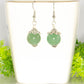 12mm Natural Green Aventurine Crystal Earrings on a tea cup