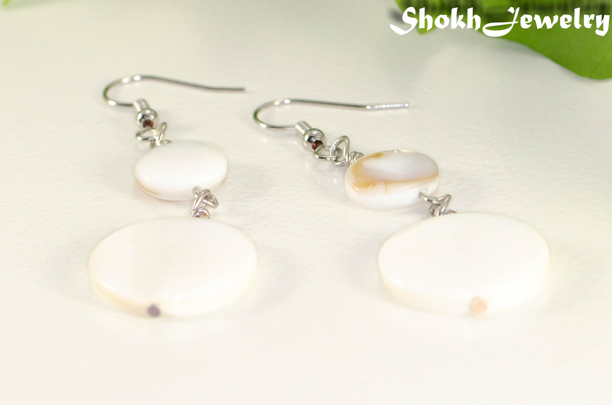 Close up of Statement White Seashell Earrings.