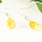 Close up of Simple Citrine Crystal Chip Earrings.