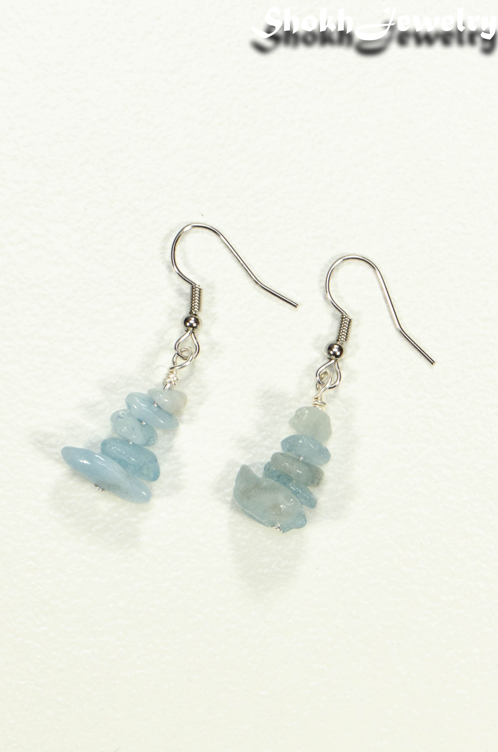 Top view of Simple Aquamarine Crystal Chip Earrings.