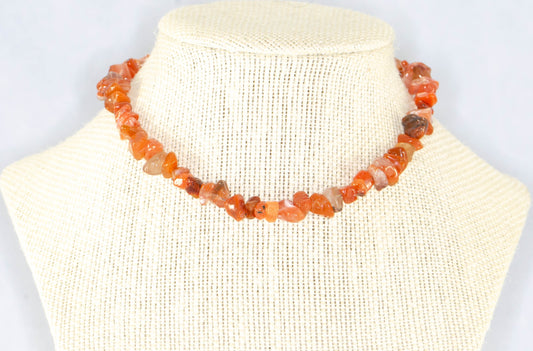 Natural Carnelian Crystal Chip Choker Necklace displayed on a bust