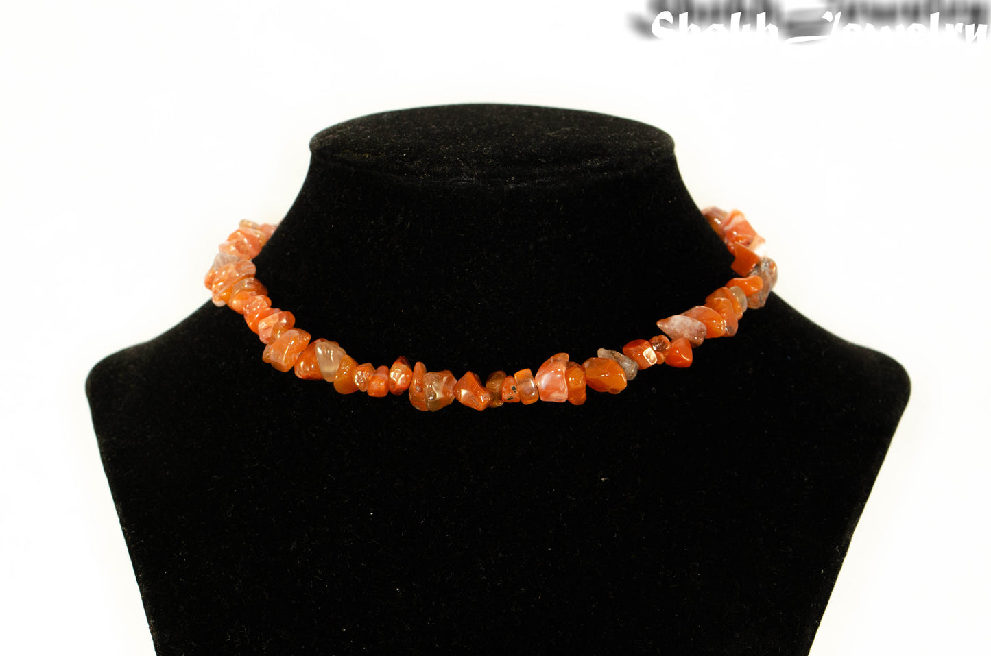Natural Carnelian Crystal Chip Choker Necklace displayed on a bust
