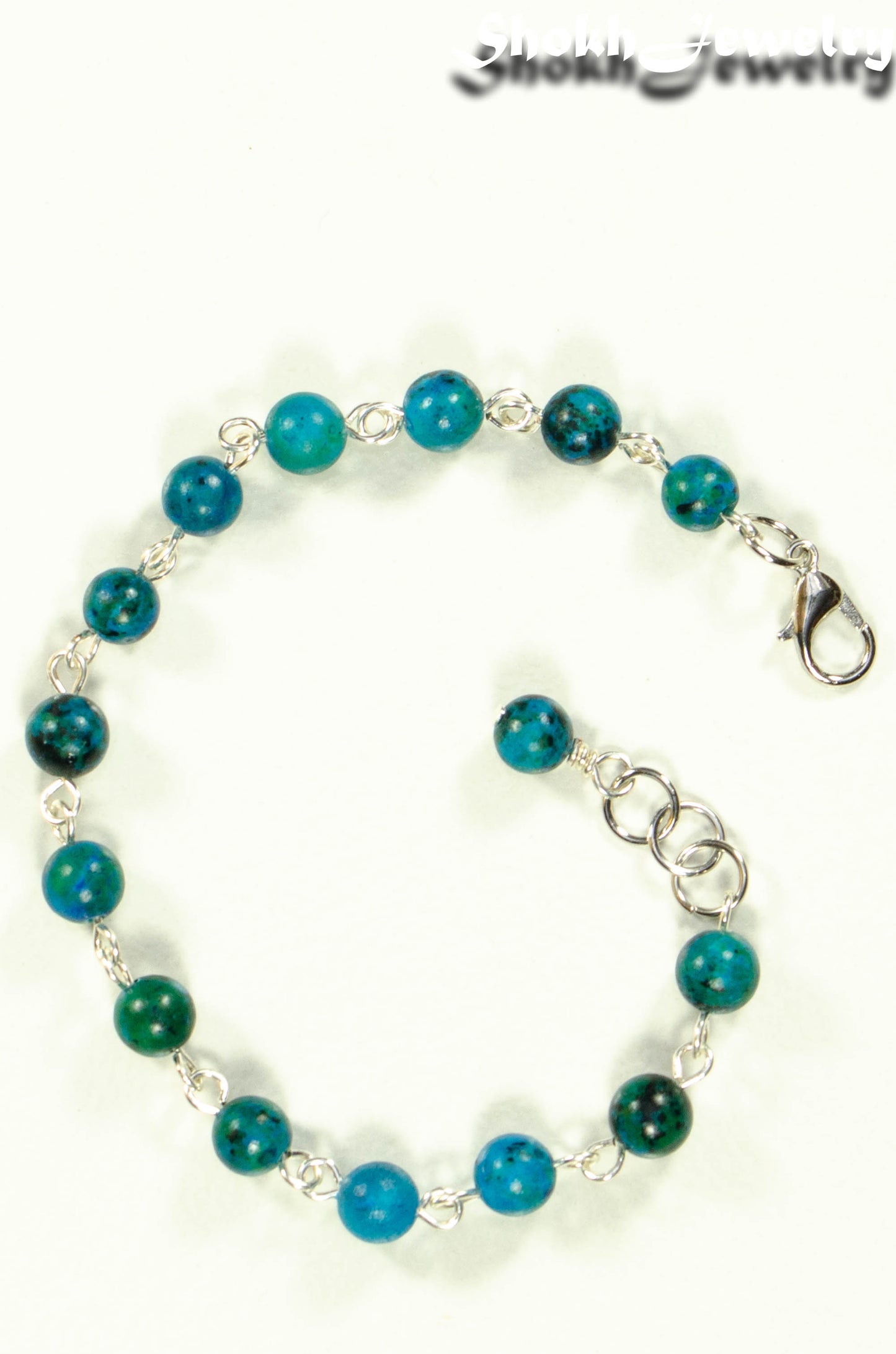 Top view of 6mm Blue Jade Link Bracelet.