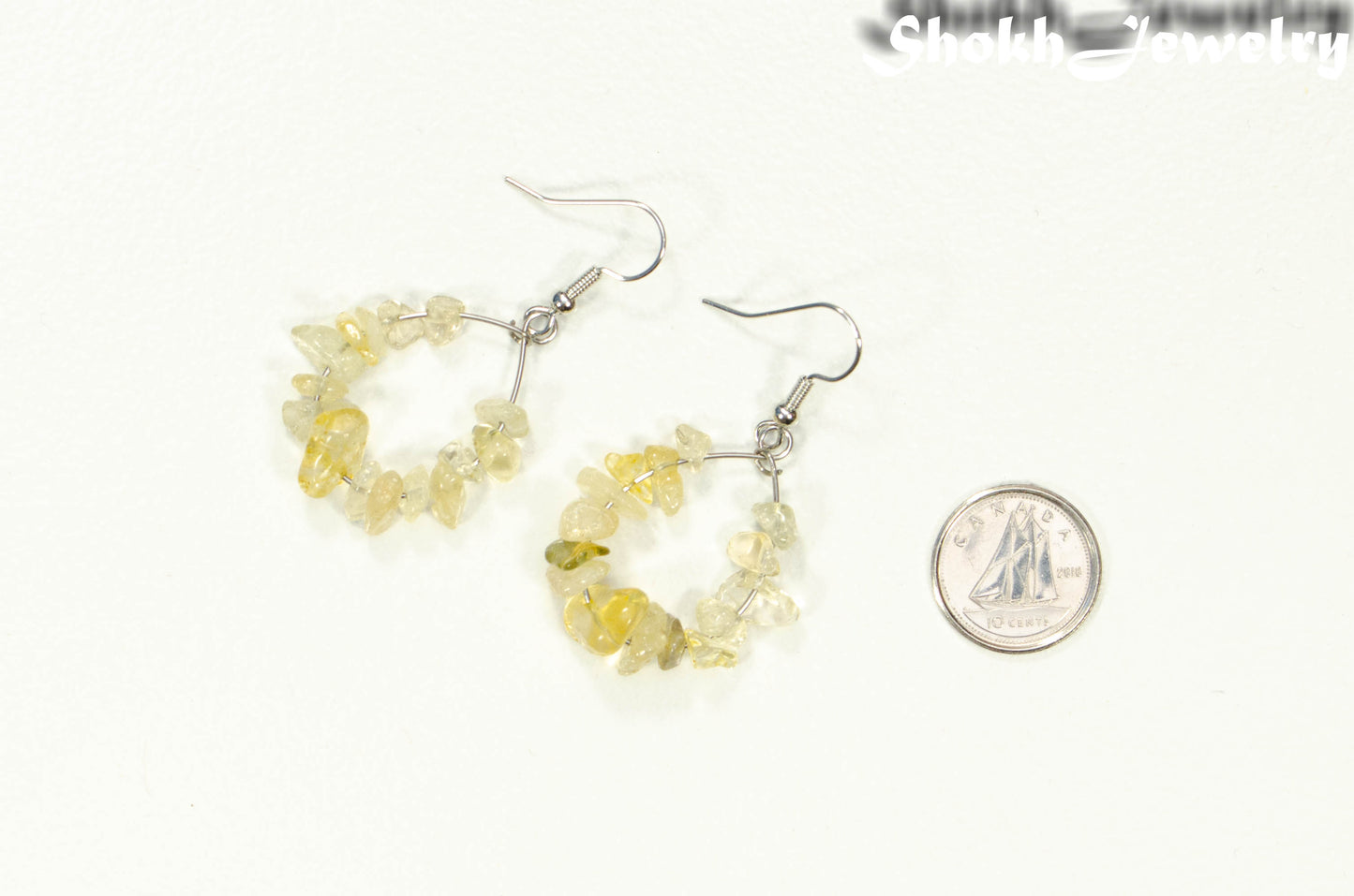 Natural Citrine Crystal Chip Earrings beside a dime