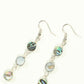 Top view of Long Natural Abalone Shell Earrings.