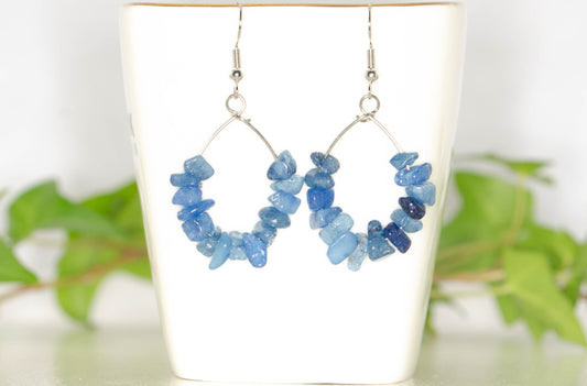 Natural Blue Quartzite Crystal Chip Earrings on a tea cup