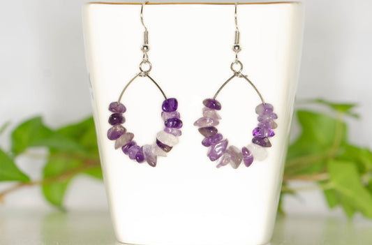 Natural Amethyst Crystal Chip Earrings on a tea cup